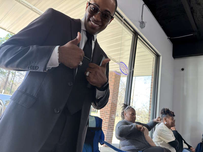 Our Leader at Spin City Laundromat Fun Filled Day covering peoples laundry expenses